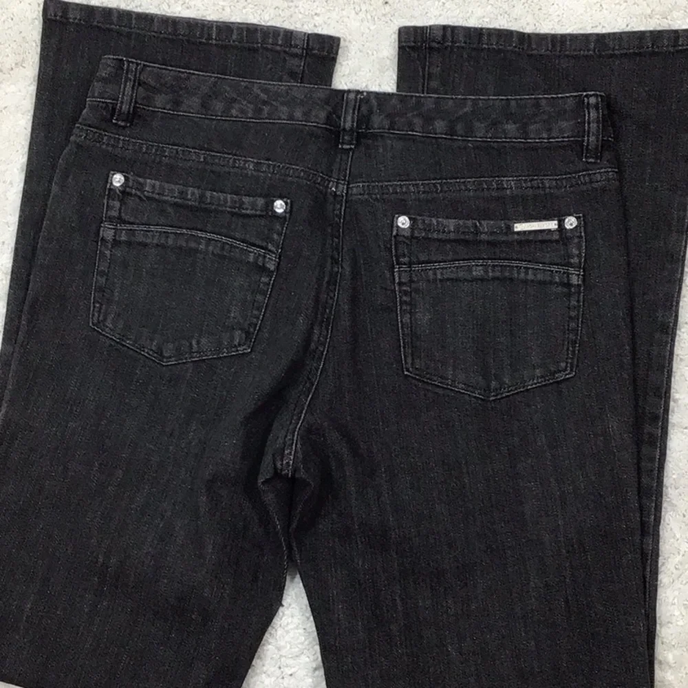 Michael Kors black bootcut jeans + MMK top